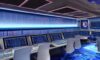 A futuristic control room with holographic interfaces, a central AI core glowing blue, surrounded by developers in sleek suits, screens displaying code and real‑time analytics, cinematic lighting highlighting the metallic surfaces, sharp details, …